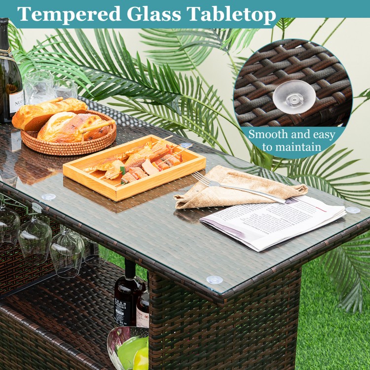 Outdoor wicker bar table featuring a tempered glass tabletop, with a spacious storage area and elegant brown PE rattan.